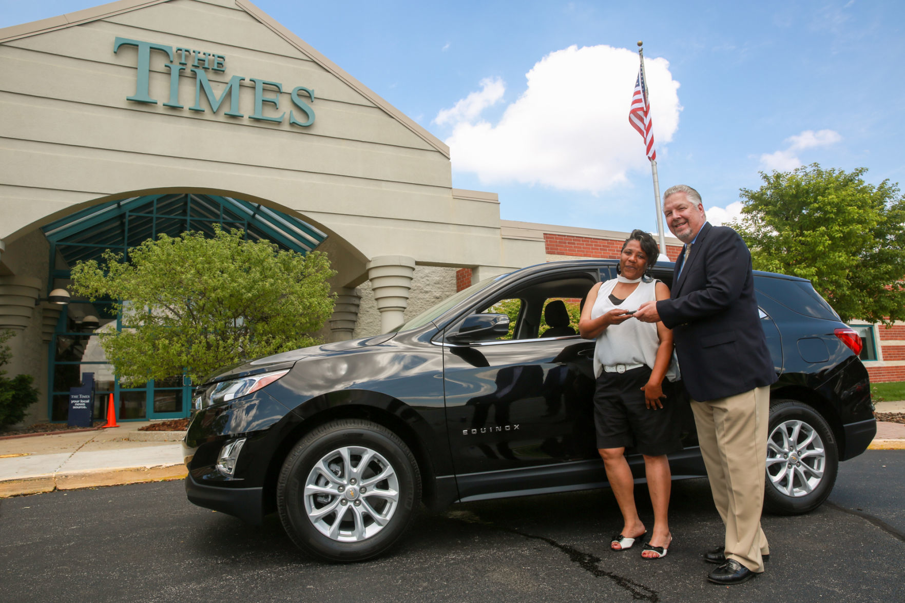 Presentation of new Chevy to Times/Chevy contest winner Lolita Whitehead